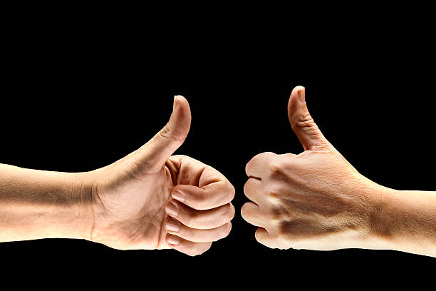 Two Thumbs Up.  You could even turn this image upside down, for two thumbs down, if you like.